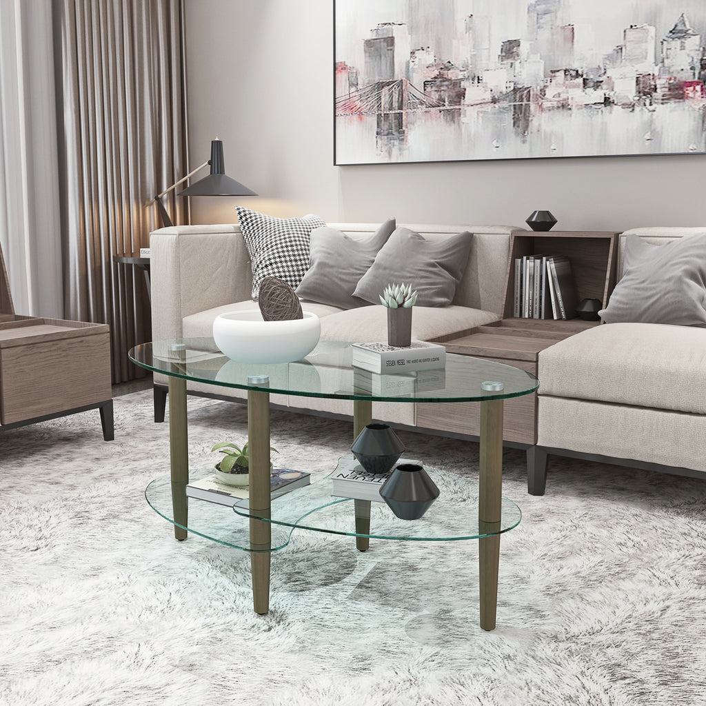 Modern oval coffee table with clear glass surfaces