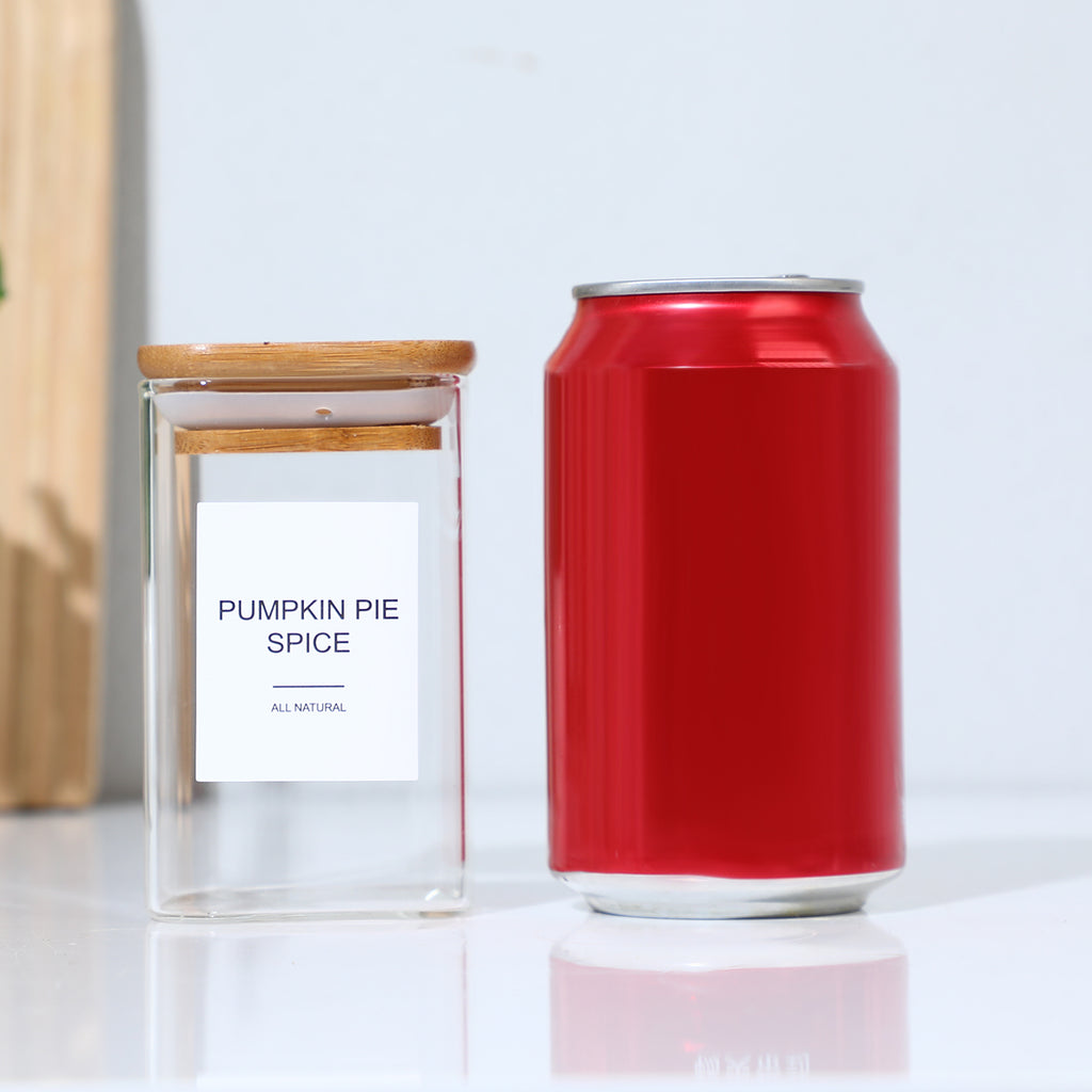 12 matching glass spice jars with 72 labels