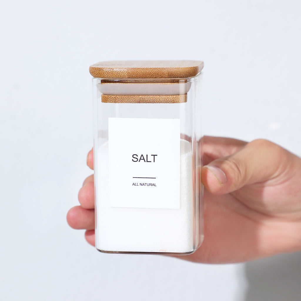 Kitchen spice organization set with glass jars
