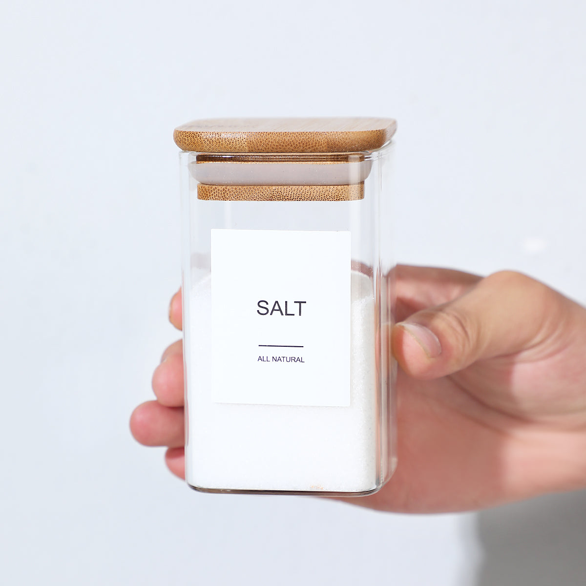 Kitchen spice organization set with glass jars