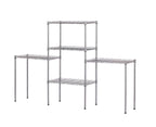 Tall adjustable storage rack for kitchen or utility room