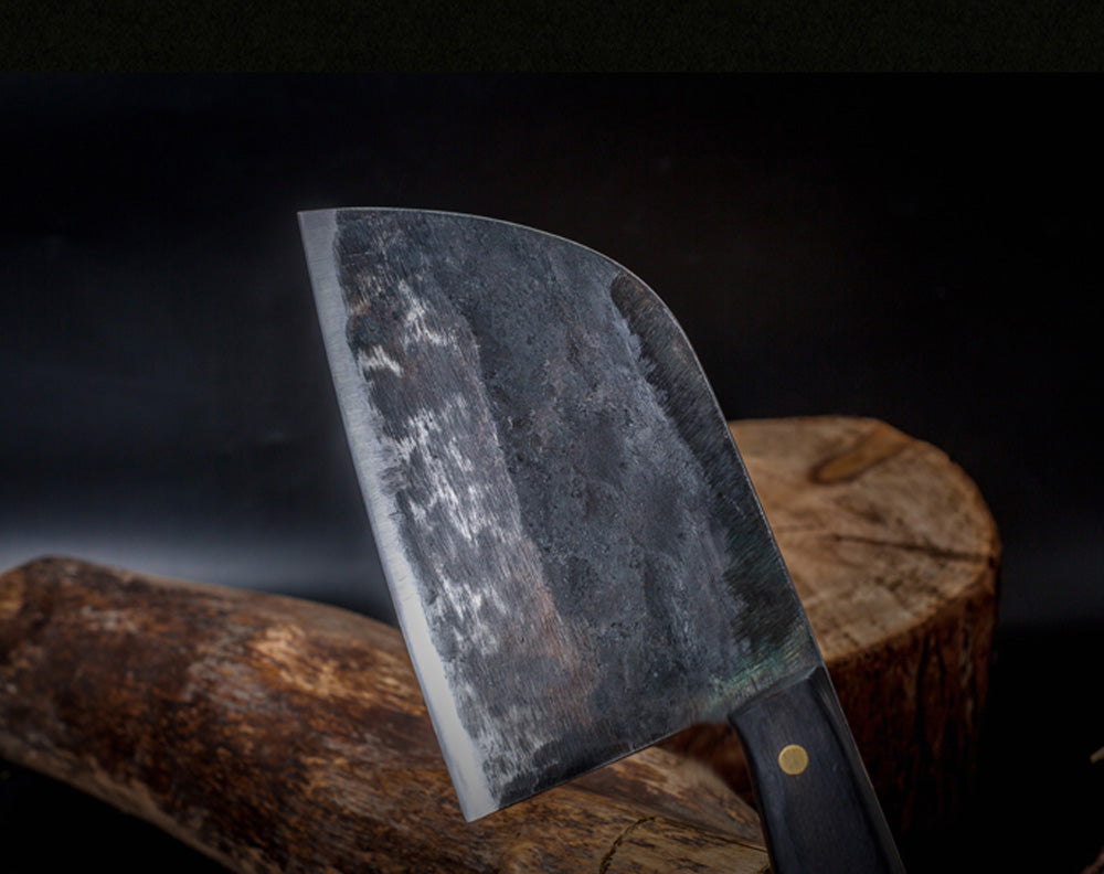 Traditional cleaver knife on a wooden block with a dark background