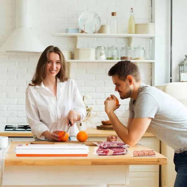 Compact dry and wet food vacuum sealer with starter bags